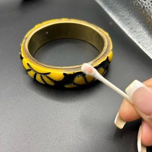 Vintage butterscotch carved Bakelite bangle, tested 10 1/2 inches wide